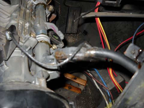 1993 Ford C-150 (Centurion Conversions) - The interior view shows the steering column assembly, wiring harness, and pedals, with no visible year-identifying features.