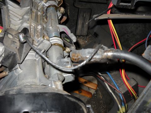1993 Ford C-150 (Centurion Conversions) - The steering column assembly and associated wiring are visible in this interior shot.