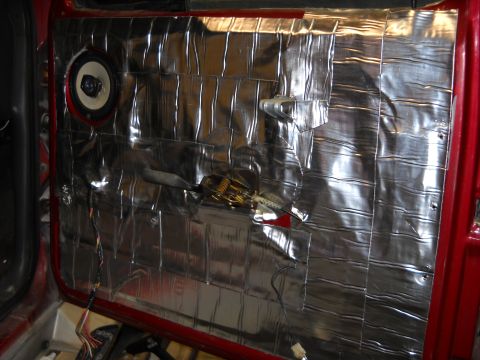 1993 Ford C-150 (Centurion Conversions) - Car door interior with sound deadening material and speaker installed.