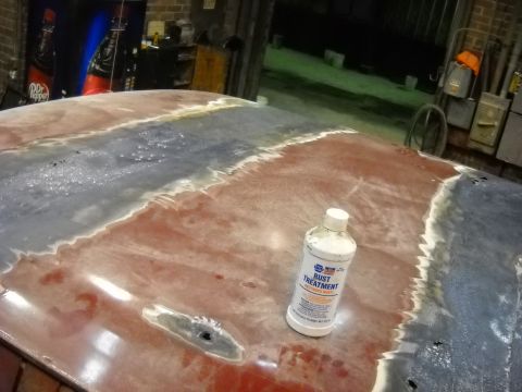 1993 Ford C-150 (Centurion Conversions) - Car roof repair in progress, showing rust treatment product.