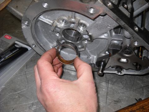 1993 Ford C-150 (Centurion Conversions) - Installing a bearing ring into a transmission housing, with CRC lube nearby.