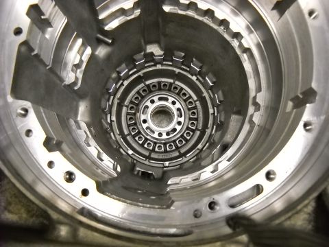 1993 Ford C-150 (Centurion Conversions) - Close-up view of the internal components of a transmission torque converter housing.