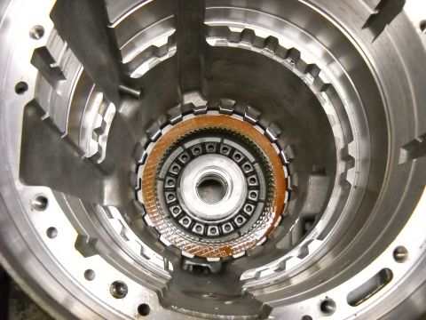 1993 Ford C-150 (Centurion Conversions) - Internal view of an automatic transmission clutch pack, showing friction discs and steel plates.