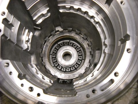 1993 Ford C-150 (Centurion Conversions) - Internal view of a transmission part, showing intricate metal components and gears.