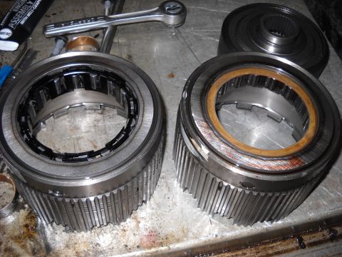 1993 Ford C-150 (Centurion Conversions) - Close-up of transmission clutch packs, one showing significant wear on its friction ring.