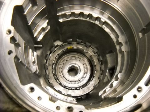 1993 Ford C-150 (Centurion Conversions) - Internal components of an automatic transmission, likely undergoing a rebuild.