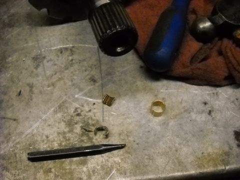 1993 Ford C-150 (Centurion Conversions) - Transmission parts and tools are laid out on a workbench, likely for a rebuild.