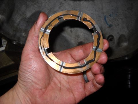 1993 Ford C-150 (Centurion Conversions) - Transmission clutch pack ring with sealant applied, ready for reassembly.