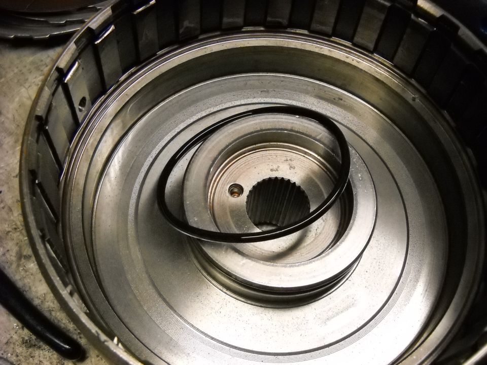 Close-up of a transmission drum with a rubber seal ring inside