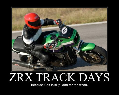 2001 Kawasaki KZ1000-A1 - Motorcycle rider on a green sportbike during a track day event.