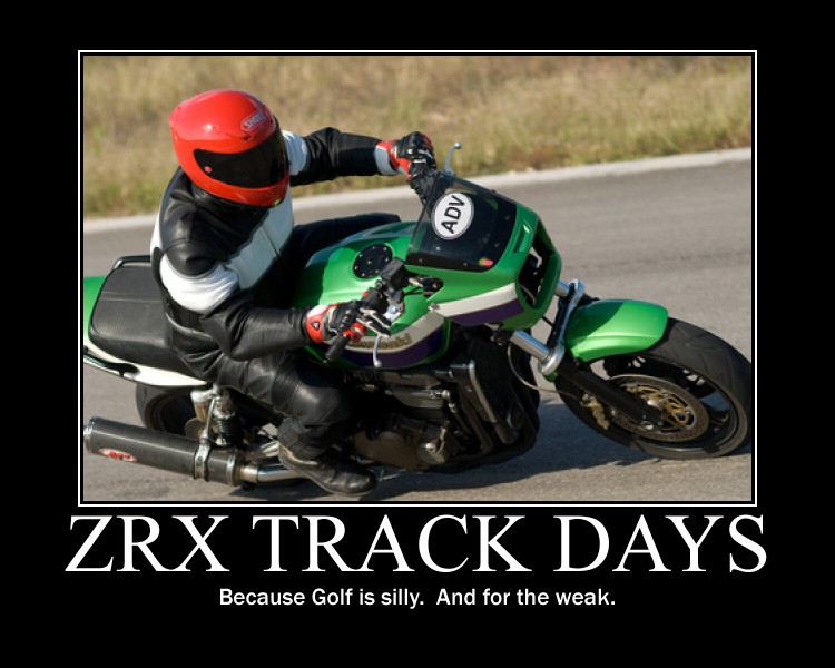 Green motorcycle leaning into a track corner, rider in black leathers and red helmet, poster text below.