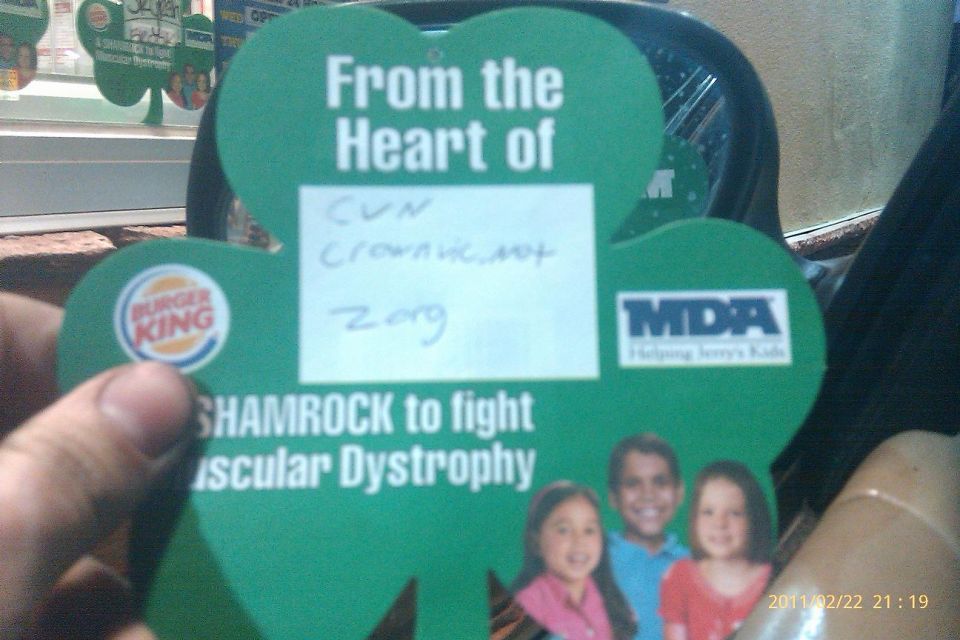 Photo of a Burger King MDA shamrock charity donation card