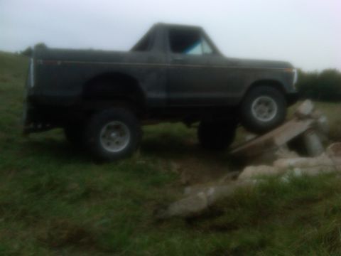 1978 Ford Bronco - This 1978 Ford Bronco is navigating an obstacle course on a grassy hill.