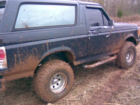 1991 Ford Bronco - This 1991 Ford Bronco is covered in mud after an off-road excursion.