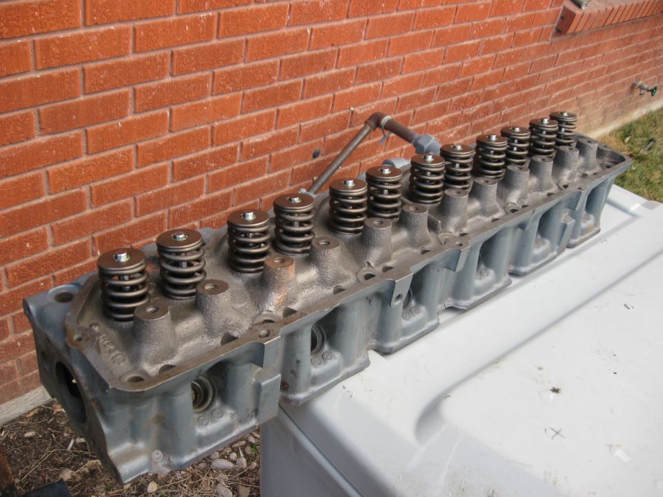 Engine cylinder head with valve springs