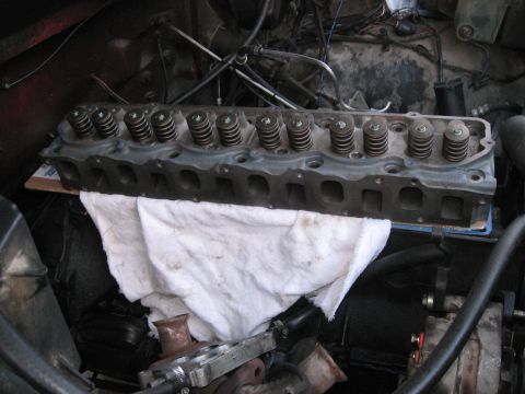 1981 Ford Bronco - A close-up view of an engine's cylinder head, showing its internal components and valve springs.