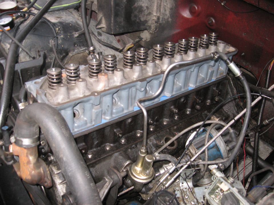 close-up of an engine's cylinder head with valve springs visible