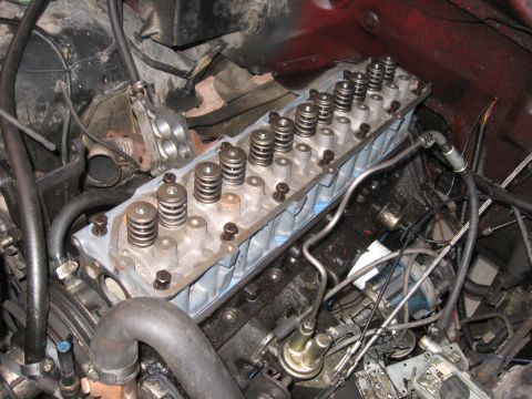 1981 Ford Bronco - Close-up of an engine's cylinder head, showing valve springs and associated hardware.
