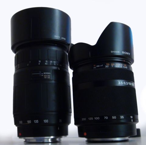 1993 Ford Taurus - Two camera lenses are shown, one is a Sony 3.5-6.3/18-200 zoom lens.