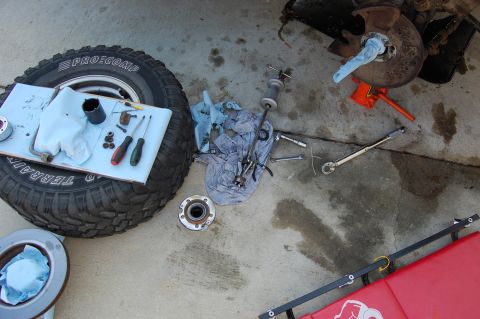 1994 Ford Bronco - Replacing the spindle bearing and seals. The old spindle bearing and seal had just been pulled in this pic.