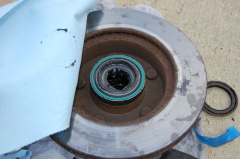 1994 Ford Bronco - New wheel seal installed and bearing packed with grease. note the shop towel used to keep contaminants out.
