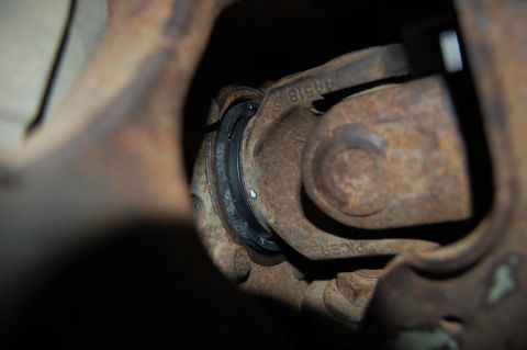 1994 Ford Bronco - New spindle bearing seals installed. Only the outer spindle bearing seal is visible.