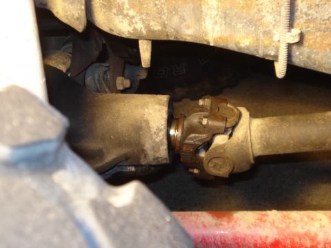 1985 Ford Bronco - Close-up of the driveshaft and universal joint on a 1985 Ford Bronco.