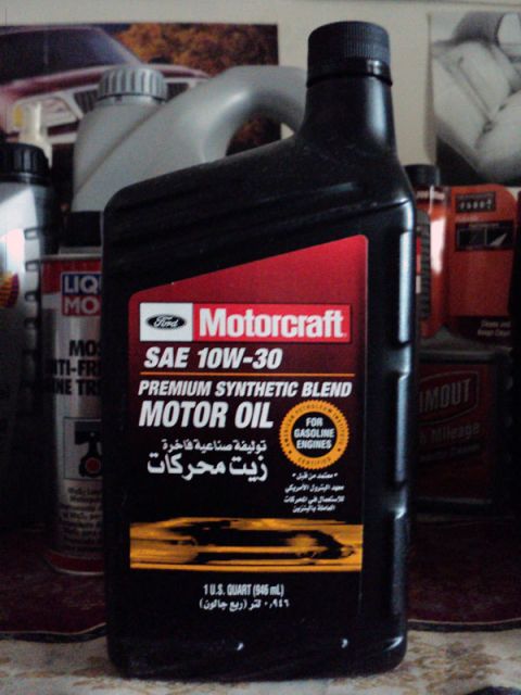 1999 Mercury Grand Marquis - Bottle of Motorcraft 10W-30 premium synthetic blend motor oil.