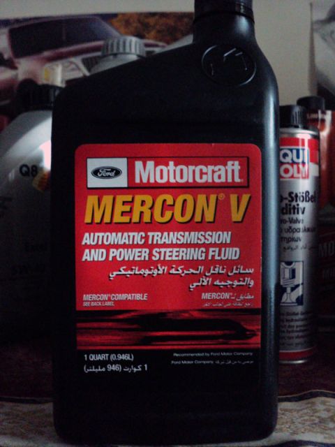 1999 Mercury Grand Marquis - A bottle of Motorcraft Mercon V automatic transmission and power steering fluid is shown with its label.