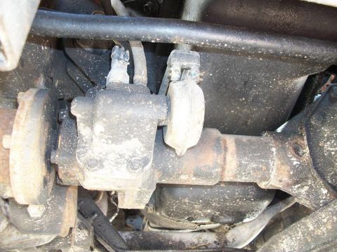 1994 Ford Explorer - Underside view of a vehicle's drivetrain components, including the differential and suspension.