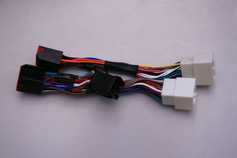 2003 Ford Taurus - This is a wiring harness with various colored wires and connectors.