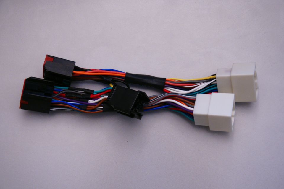 Wiring harness with multiple colored wires and black and white connectors