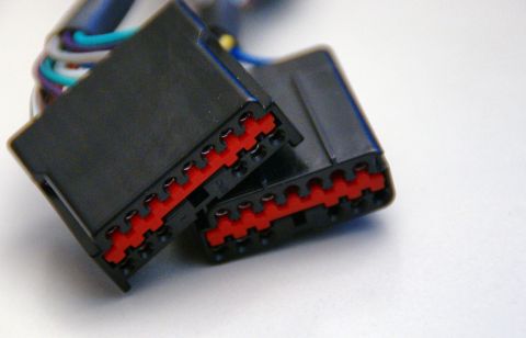 2003 Ford Taurus - Close-up of automotive wiring connectors, likely for an accessory or audio system.