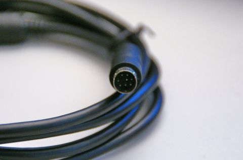 2003 Ford Taurus - This image shows a coiled audio cable with a multi-pin connector, not a 2003 Ford Taurus.