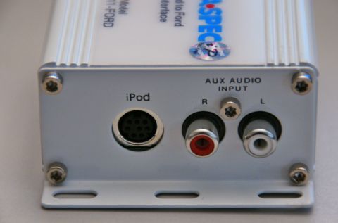 2003 Ford Taurus - iPod connection kit with RCA inputs and labeling for iPod and AUX AUDIO INPUT.