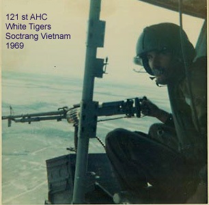 1990 Ford Probe - A helicopter crew member mans a machine gun during a mission in Vietnam.
