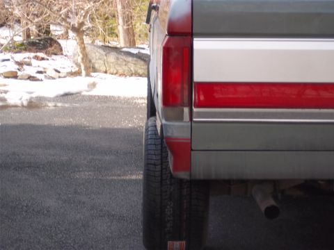 1989 Ford F-150 - Rear view of a 1989 Ford F-150 pickup truck, highlighting its distinctive body lines and trim.
