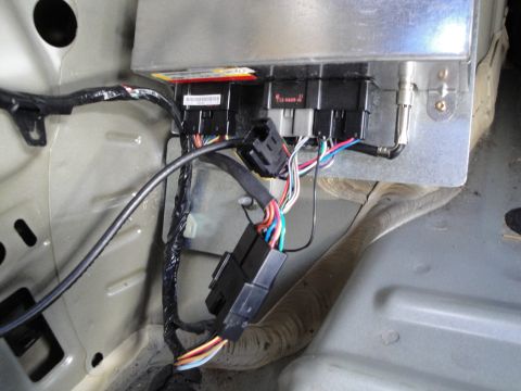 2003 Ford Taurus - This photo shows the intricate wiring and control module within a vehicle's interior, not a 2003 Ford Taurus.