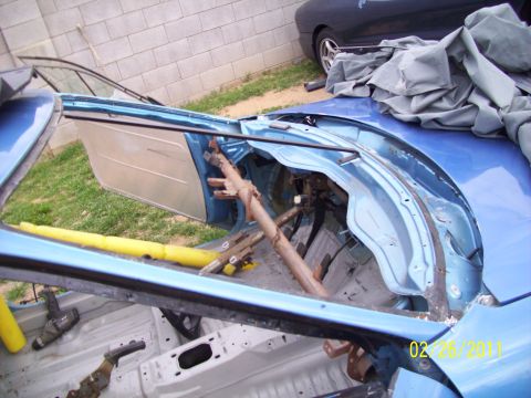 1995 Ford Probe - The interior of a car is disassembled, revealing its internal structure and frame.