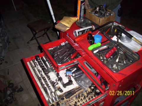 1995 Ford Probe - A collection of automotive tools is organized in a red toolbox, ready for use.