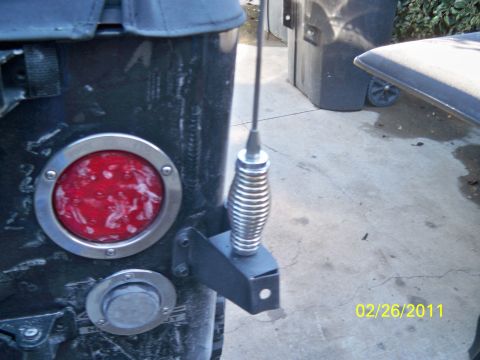 1992 Jeep Wrangler - Rear view of a 1992 Jeep Wrangler showing the taillight and an aftermarket antenna mount.