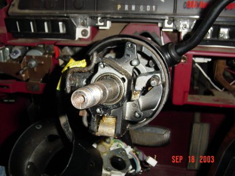 1989 Ford Bronco - Interior view of a 1989 Ford Bronco steering column, showing the PRND1 gear indicator and ignition components.