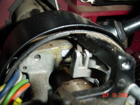 1989 Ford Bronco - Close-up view of a vehicle's ignition switch mechanism, with a date stamp of SEP 18 2003 visible.