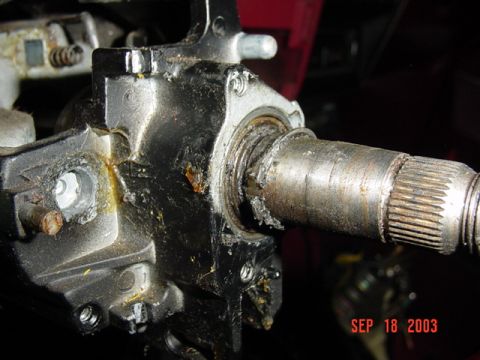1989 Ford Bronco - Damaged steering column part shown in a close-up view.