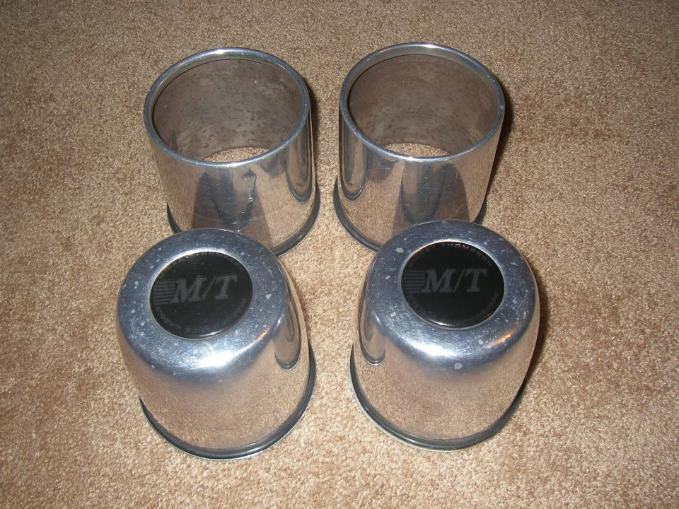 Set of four polished aluminum Mickey Thompson center caps with M/T logo
