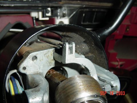 1989 Ford Bronco - Ignition switch mechanism detail, likely from a vehicle's steering column. Date: 9-18-2003.