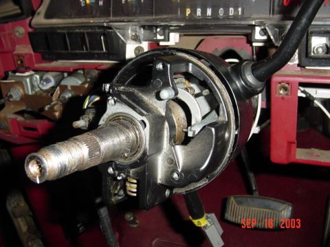 1989 Ford Bronco - The steering column of a 1989 Ford Bronco is shown disassembled for ignition repair.