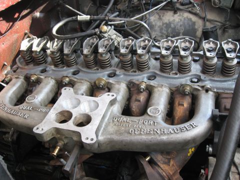1981 Ford Bronco - Inline-six with the valve cover off, showing all twelve rocker arms, valve springs and pushrods above a cast-aluminum Offenhauser 'Dual-Por…