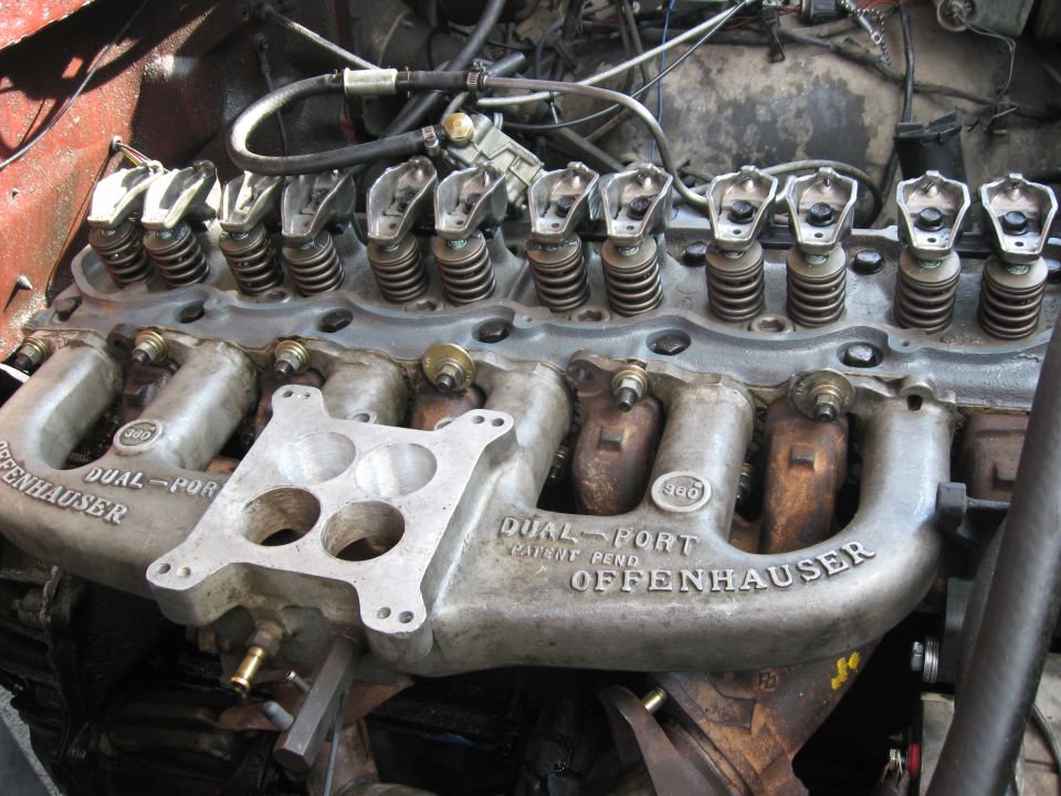 Offenhauser Dual-Port 360 intake manifold on inline six with valve cover removed
