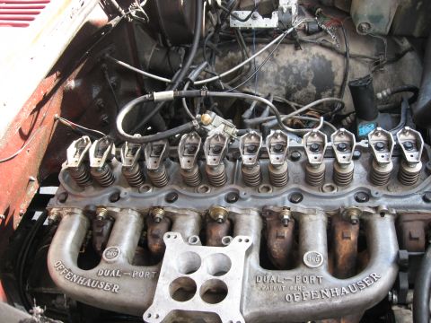 1981 Ford Bronco - Engine cylinder head and Offenhauser intake manifold with carburetor mounting plate.